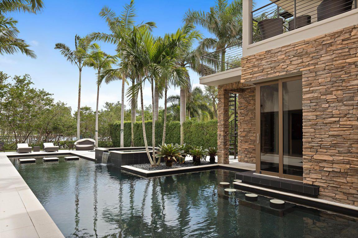 A tranquil swimming pool meets the property right at the back door