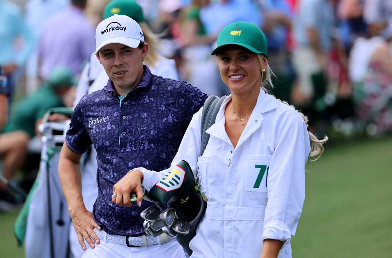 Golf - The Masters - Augusta National Golf Club - Augusta, Georgia, U.S. - April 5, 2023 England's Matthew Fitzpatrick with partner Katherine Gaal on the first green during the par 3 tournament REUTERS/Mike Blake