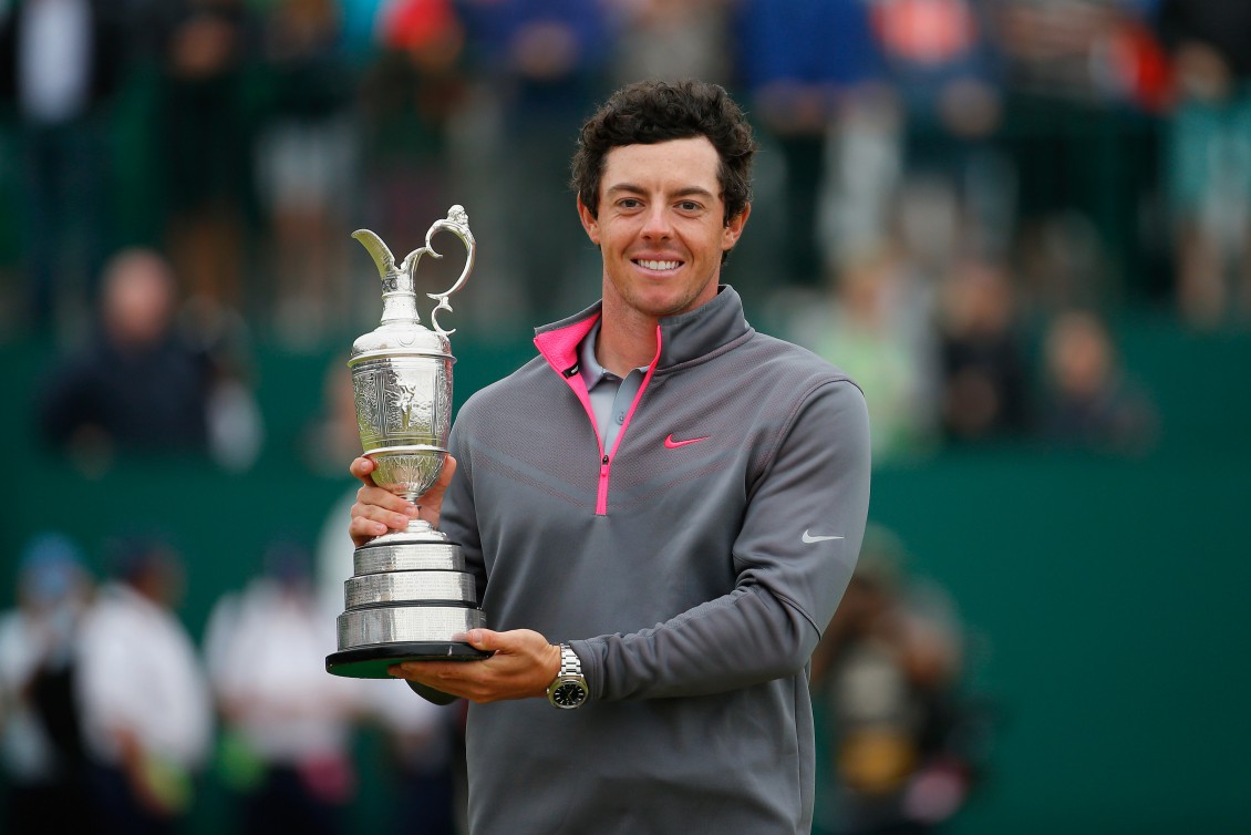 HOYLAKE, ENGLAND - JULY 20:  Rory McIlroy of Northern Ireland holds the Claret Jug after his two-stroke victory at The 143rd Open Championship at Royal Liverpool on July 20, 2014 in Hoylake, England.  (Photo by Tom Pennington/Getty Images)