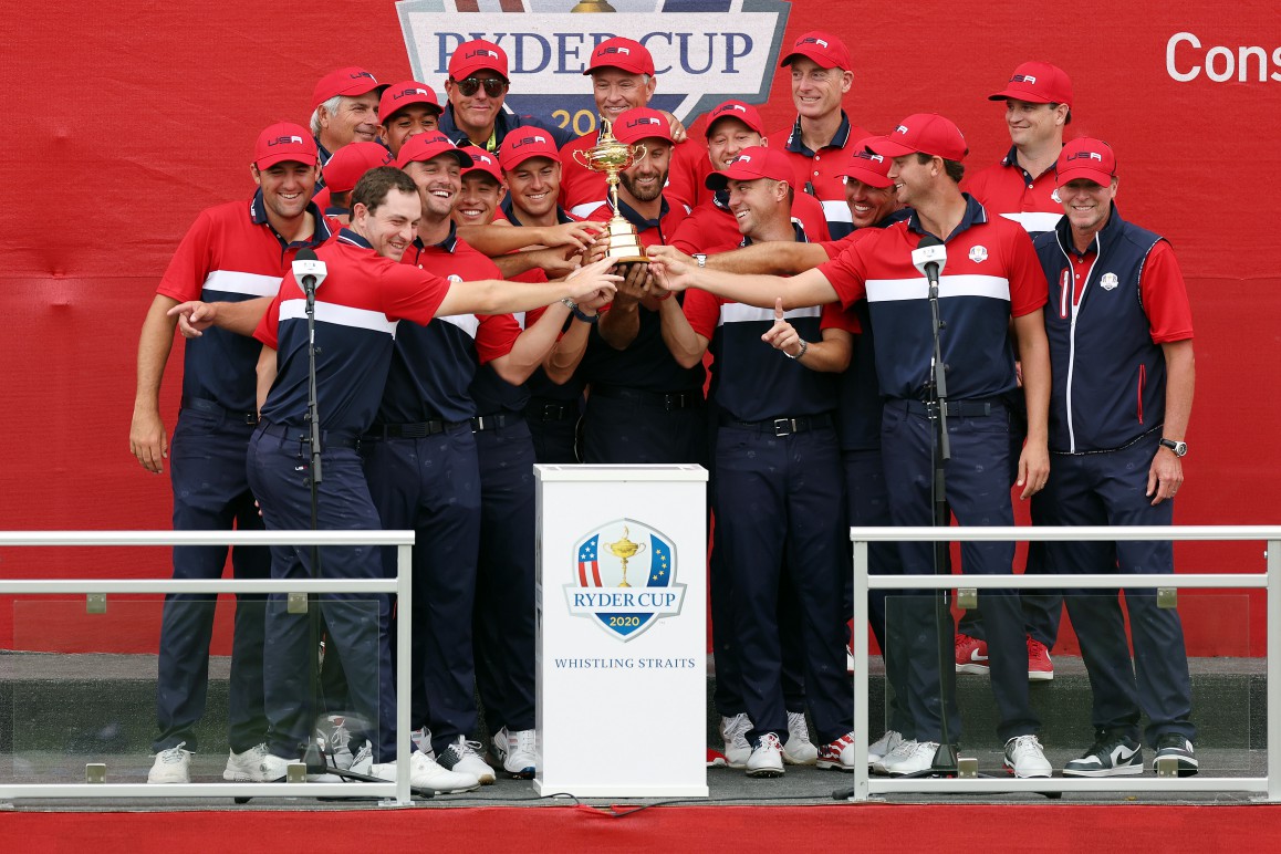 KOHLER, WISCONSIN - SEPTEMBER 26: Team United States celebrates with the Ryder Cup after defeating Team Europe 19 to 9 during Sunday Singles Matches of the 43rd Ryder Cup at Whistling Straits on September 26, 2021 in Kohler, Wisconsin. (Photo by Richard Heathcote/Getty Images)