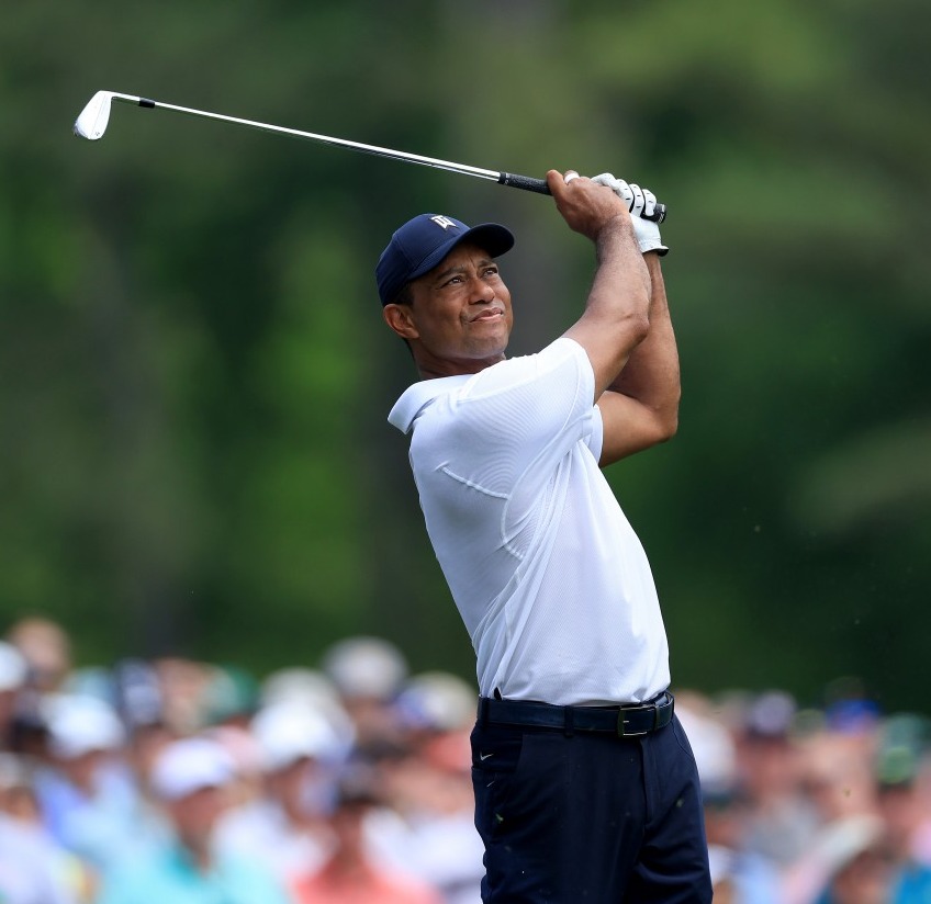 AUGUSTA, GEORGIA - APRIL 06: Tiger Woods of The United States plays his tee shot on the 12th hole during the first round of the 2023 Masters Tournament at Augusta National Golf Club on April 06, 2023 in Augusta, Georgia. (Photo by David Cannon/Getty Images)