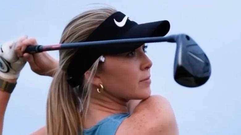 Grace Charis narrowly avoids wardrobe malfunction while playing golf braless in tiny top and asks fans ‘how’s my form?’