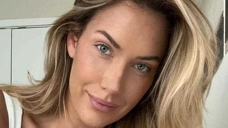 Paige Spiranac sprawls on bed in skintight gym gear as fans say ‘and I thought you couldn’t get any more beautiful’