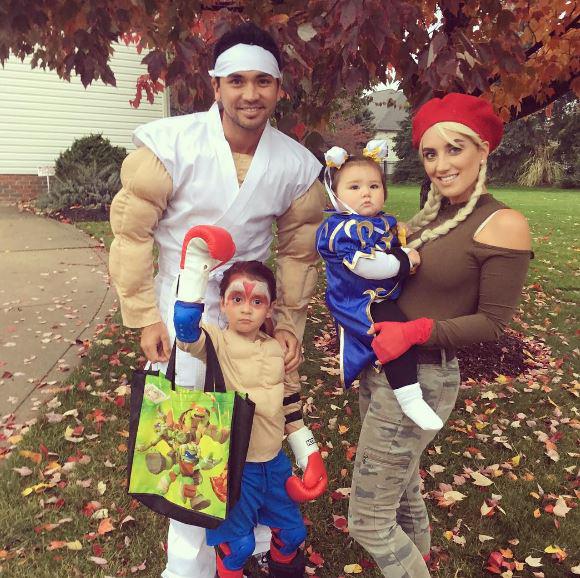 The family pose on Halloween 