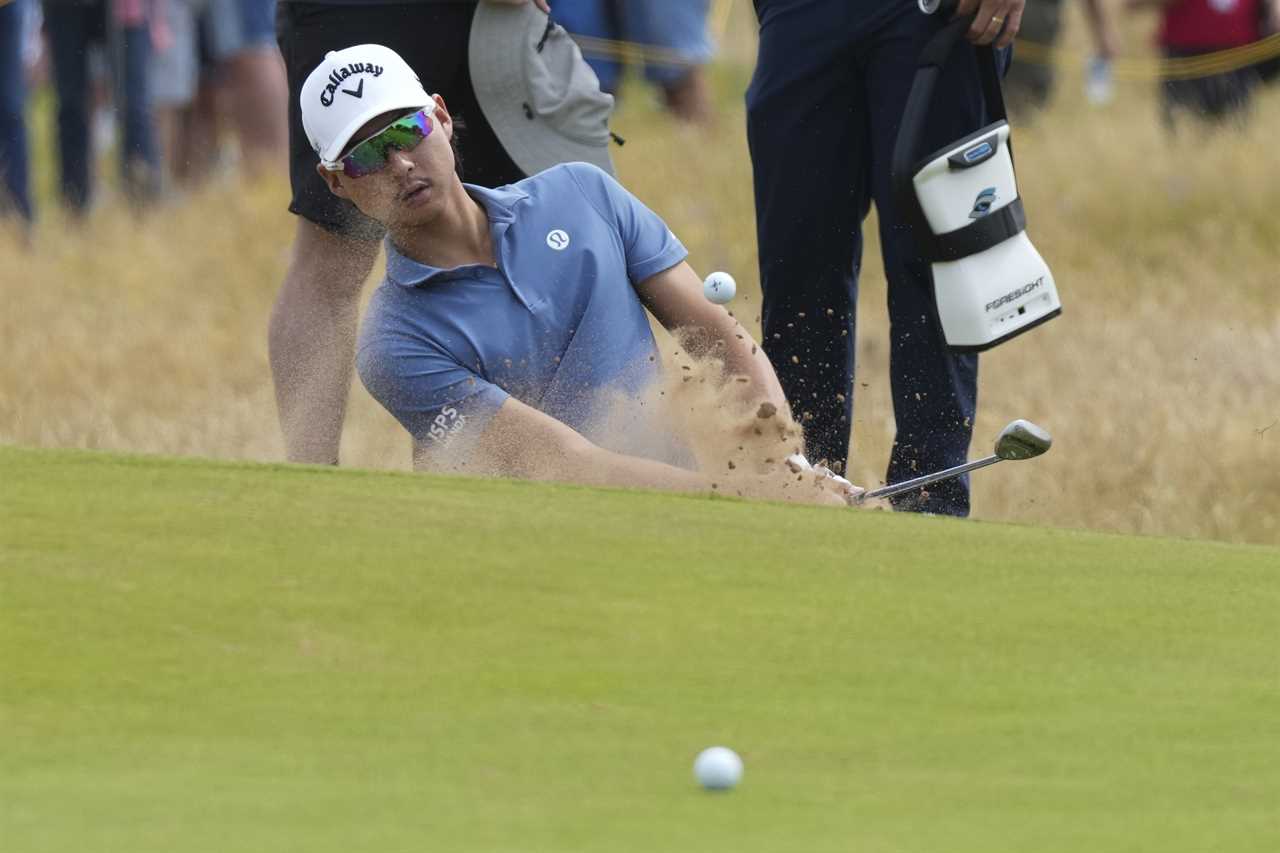 a man wearing a callaway hat is playing golf