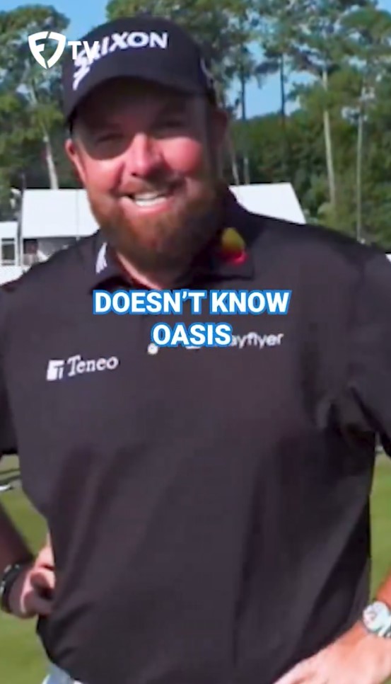 a man with a beard wearing a black shirt that says does n't know oasis