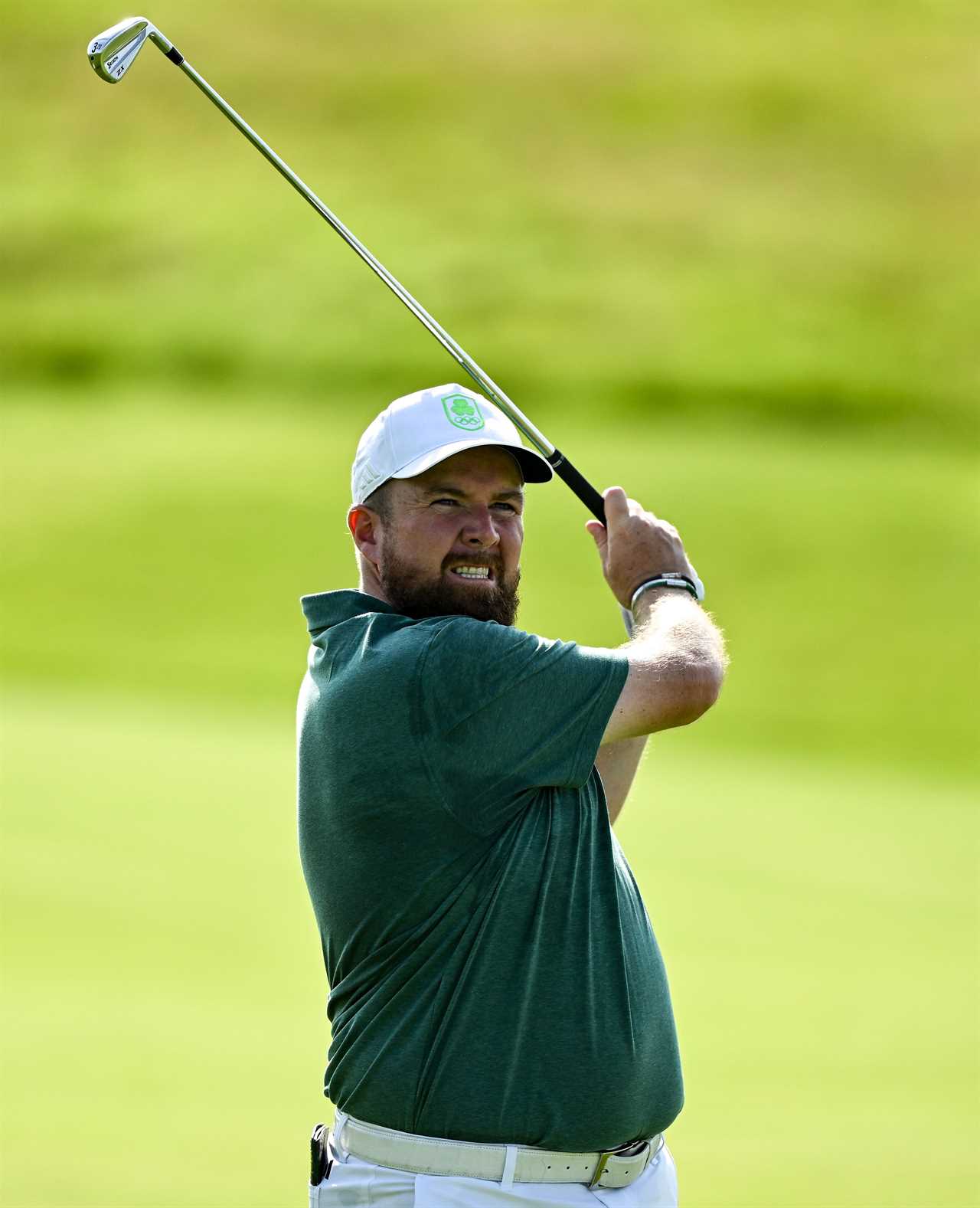 30 July 2024; Shane Lowry of Team Ireland watches his shot from the fairway during a practice round ahead of the men's golf singles at Le Golf National during the 2024 Paris Summer Olympic Games in Paris, France. Photo by Brendan Moran/Sportsfile