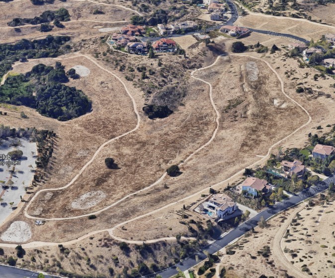 an aerial view of a residential area with lots of houses