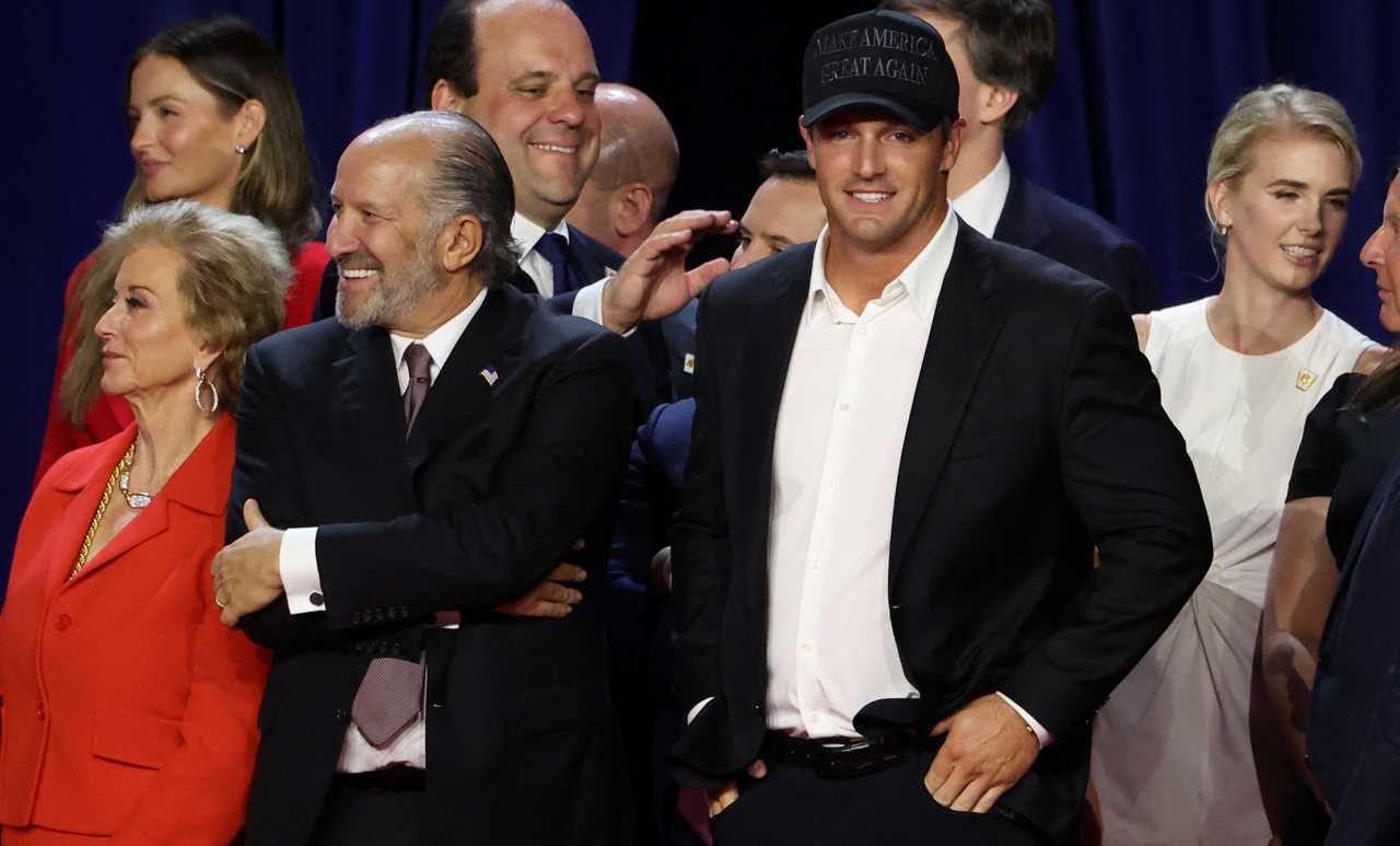 a man wearing a hat that says " great again "