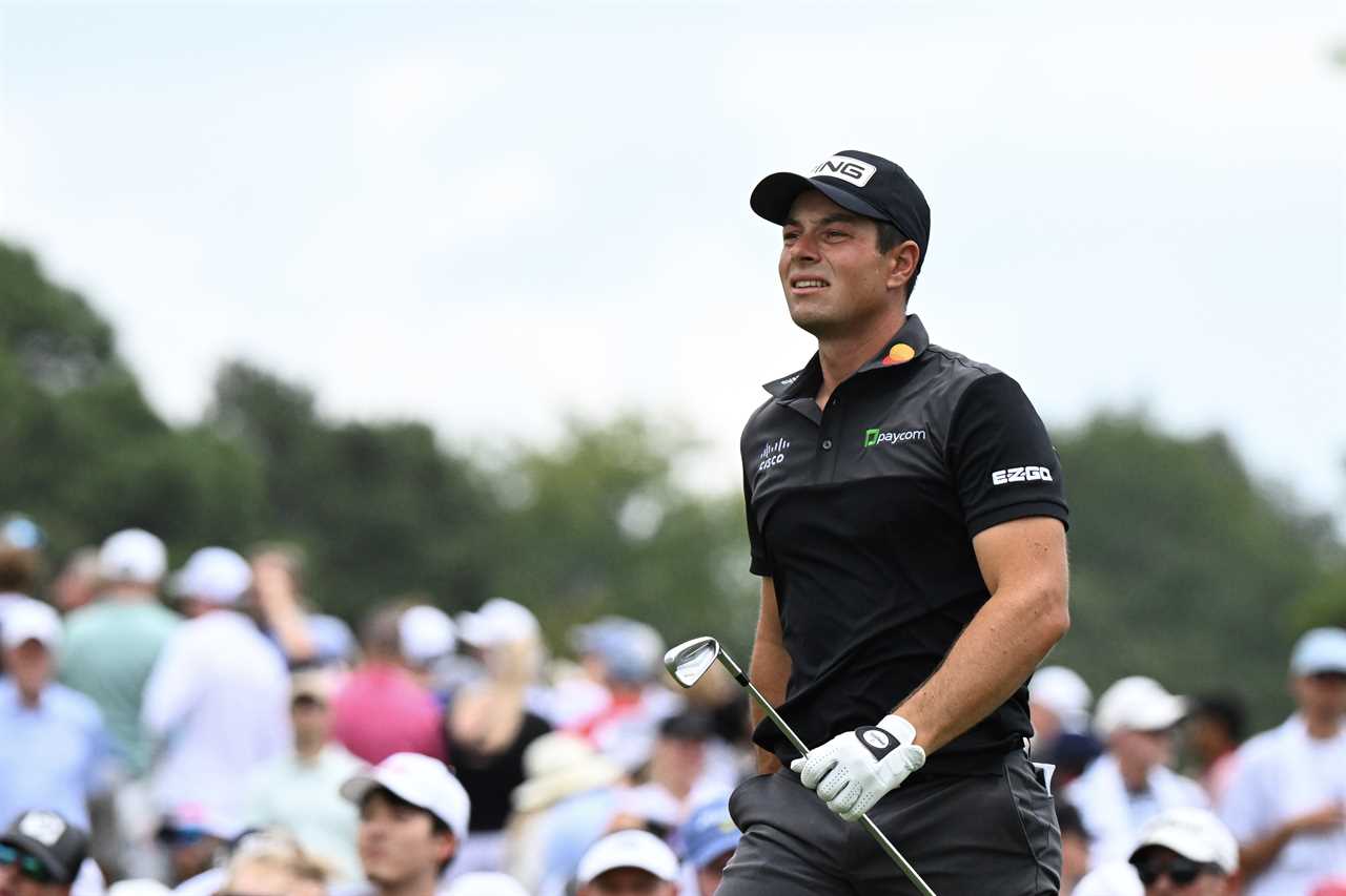 Viktor Hovland walks the ninth hole during the final round of the Tour Championship.