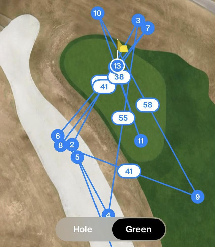 Golf course aerial view with yardage to green.