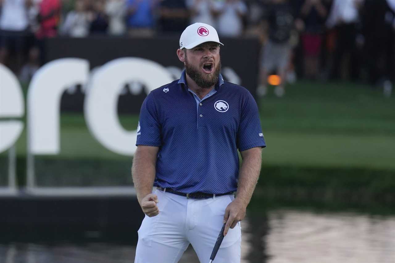 Tyrell Hatton celebrating a golf tournament win.