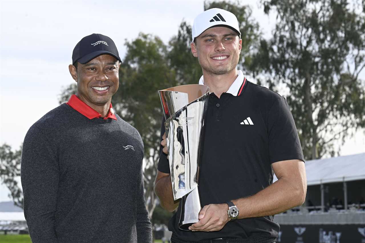 Ludvig Aberg and Tiger Woods with a golf trophy.