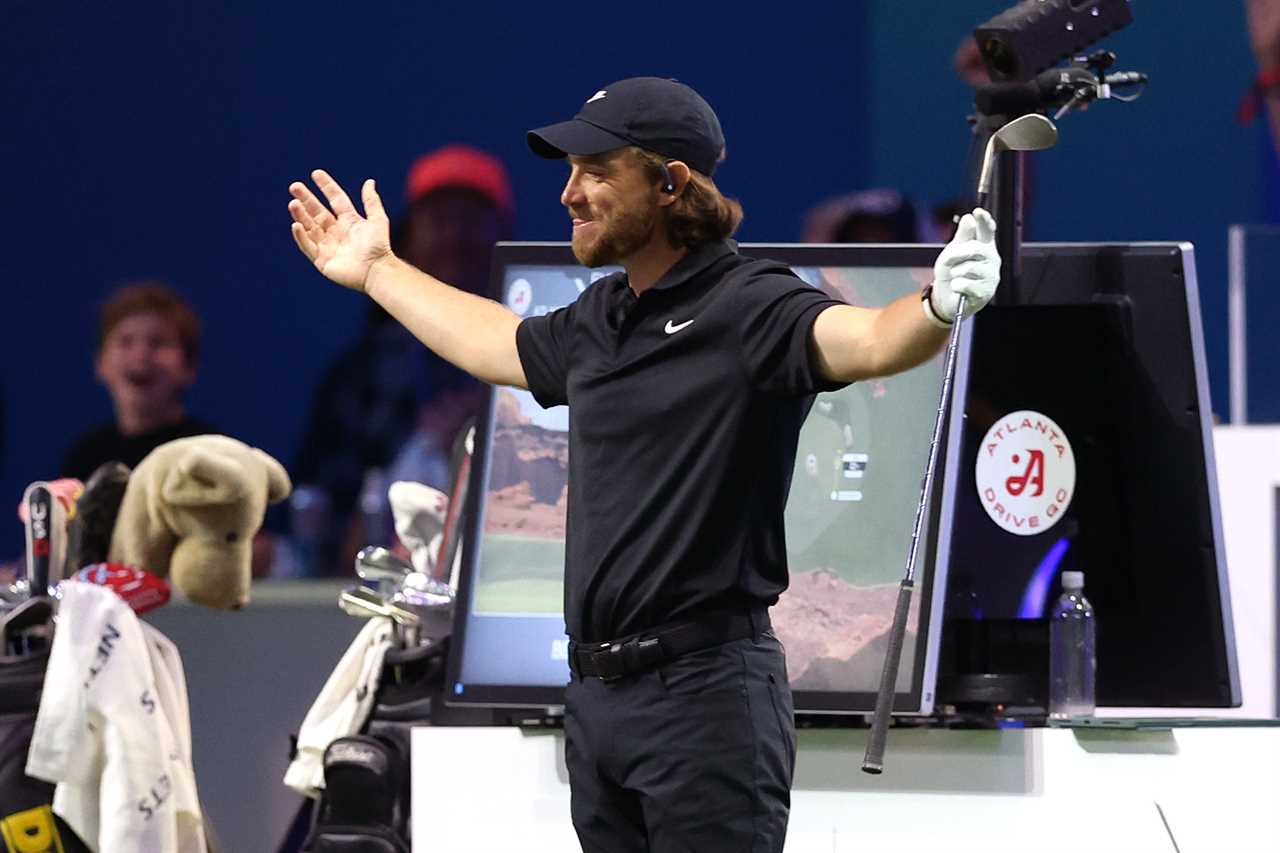 Tommy Fleetwood celebrating after a golf shot.