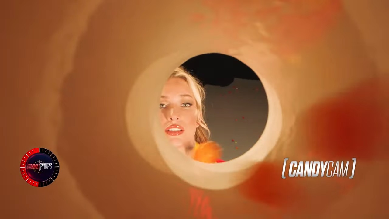 Woman looking through a hole.