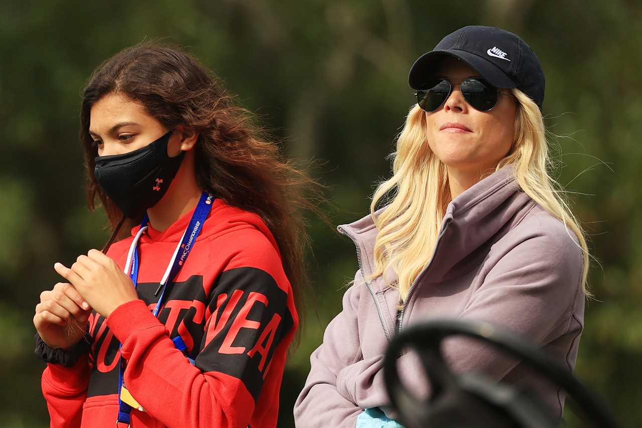 Sam Woods and Elin Nordegren at a golf tournament.