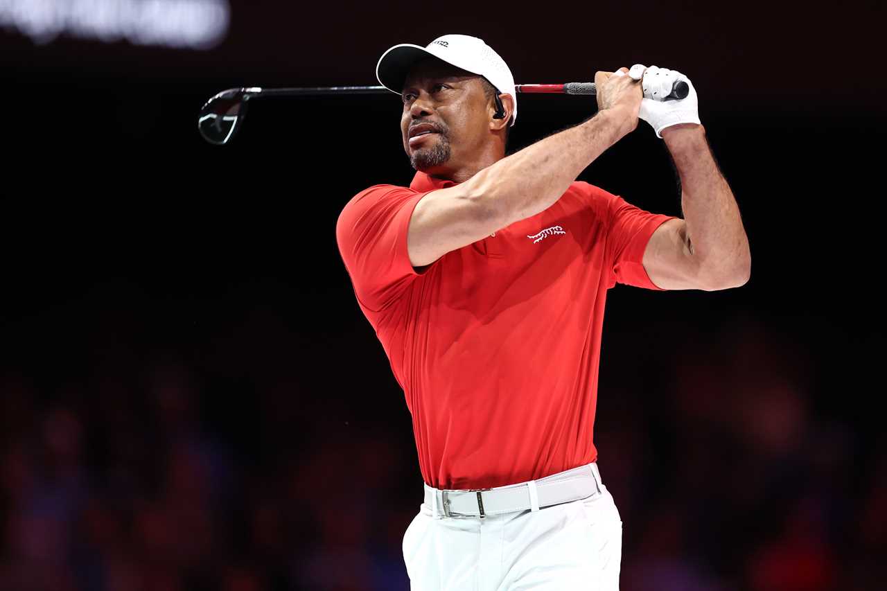 Tiger Woods taking a golf swing.