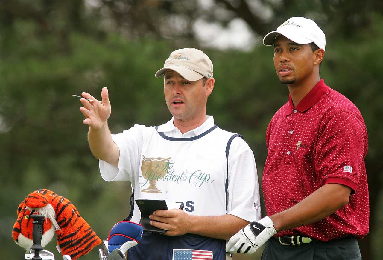 Tiger Woods and his caddie, Billy Foster, at the 2005 Presidents Cup.