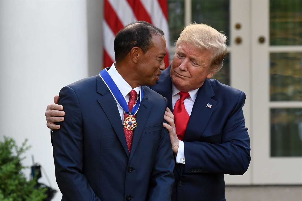 President Trump presenting Tiger Woods with the Presidential Medal of Freedom.