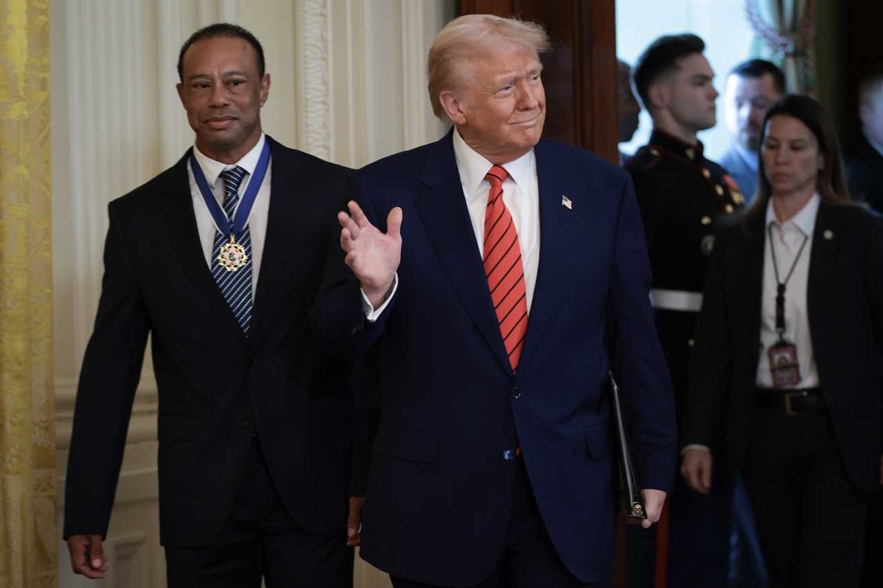 President Donald Trump and Tiger Woods at a Black History Month reception.