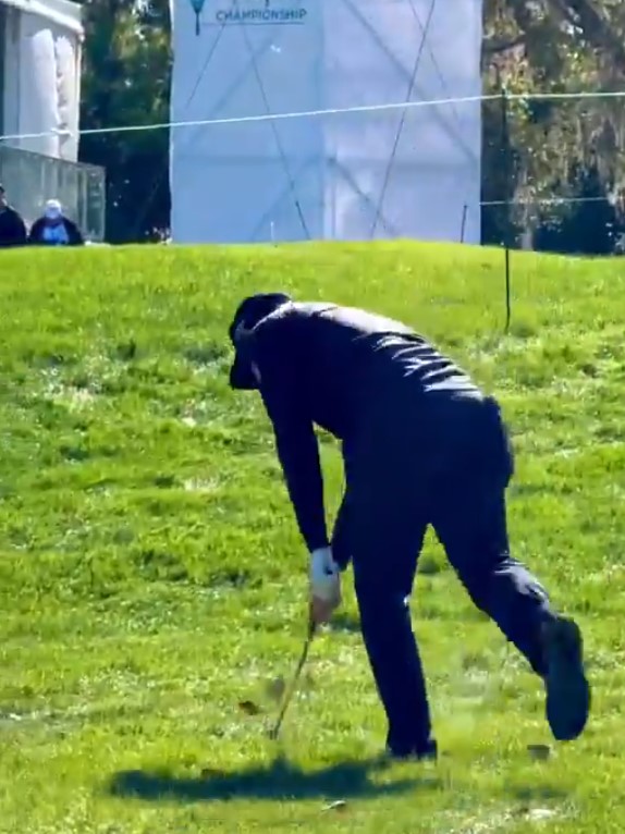 Golfer Adam Hadwin breaking his club.