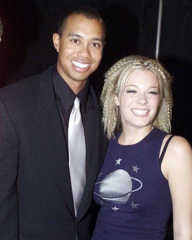 Tiger Woods and LeeAnn Rimes at an event.