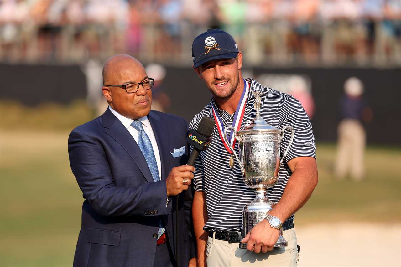 Bryson DeChambeau being interviewed after winning the U.S. Open, holding the trophy.