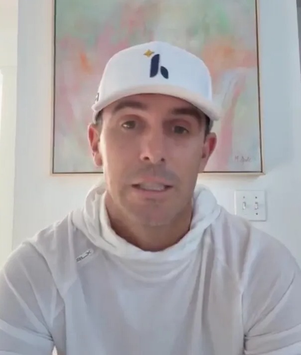 Billy Horschel in a white shirt and hat.