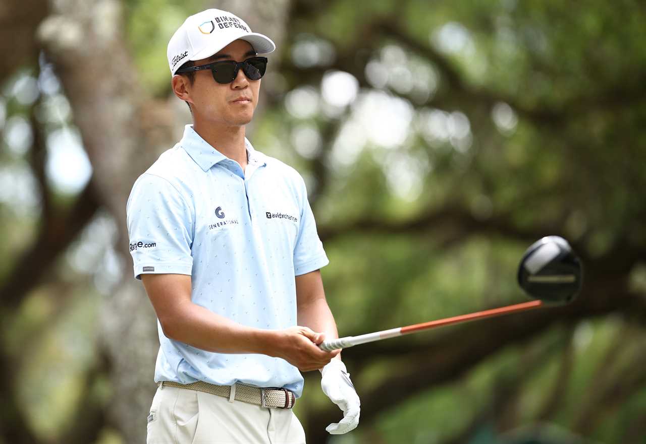 Michael Kim lines up a shot during a golf tournament.
