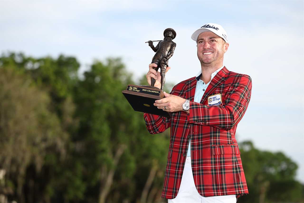 Justin Thomas holding the RBC Heritage 2025 champion trophy.