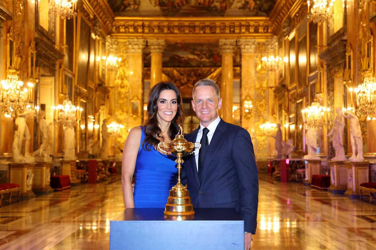 Luke Donald and his wife Diane with the Ryder Cup trophy.
