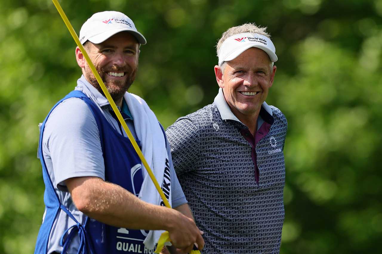 Luke Donald of England and his caddie Sam Matton at the PGA Championship.