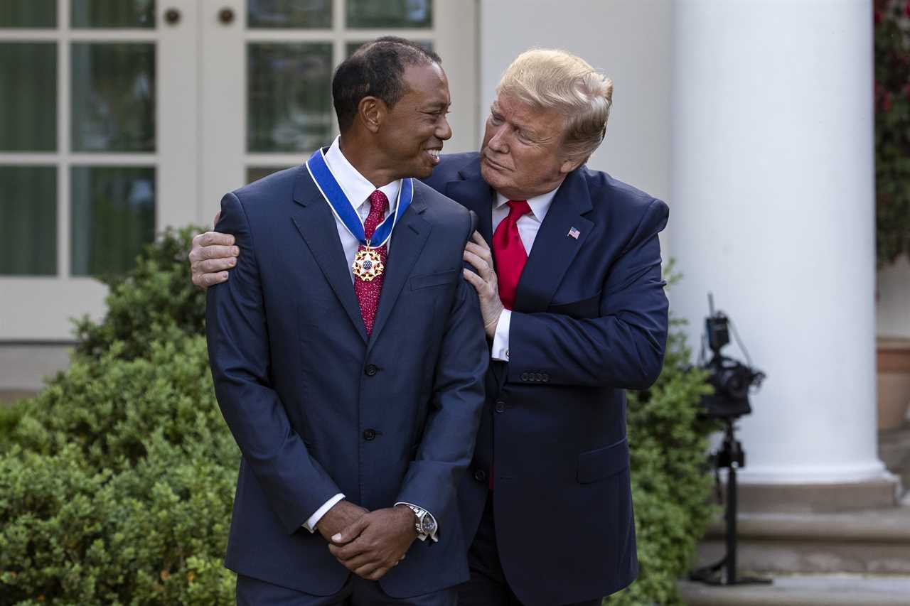 President Donald Trump awarding Tiger Woods the Presidential Medal of Freedom.