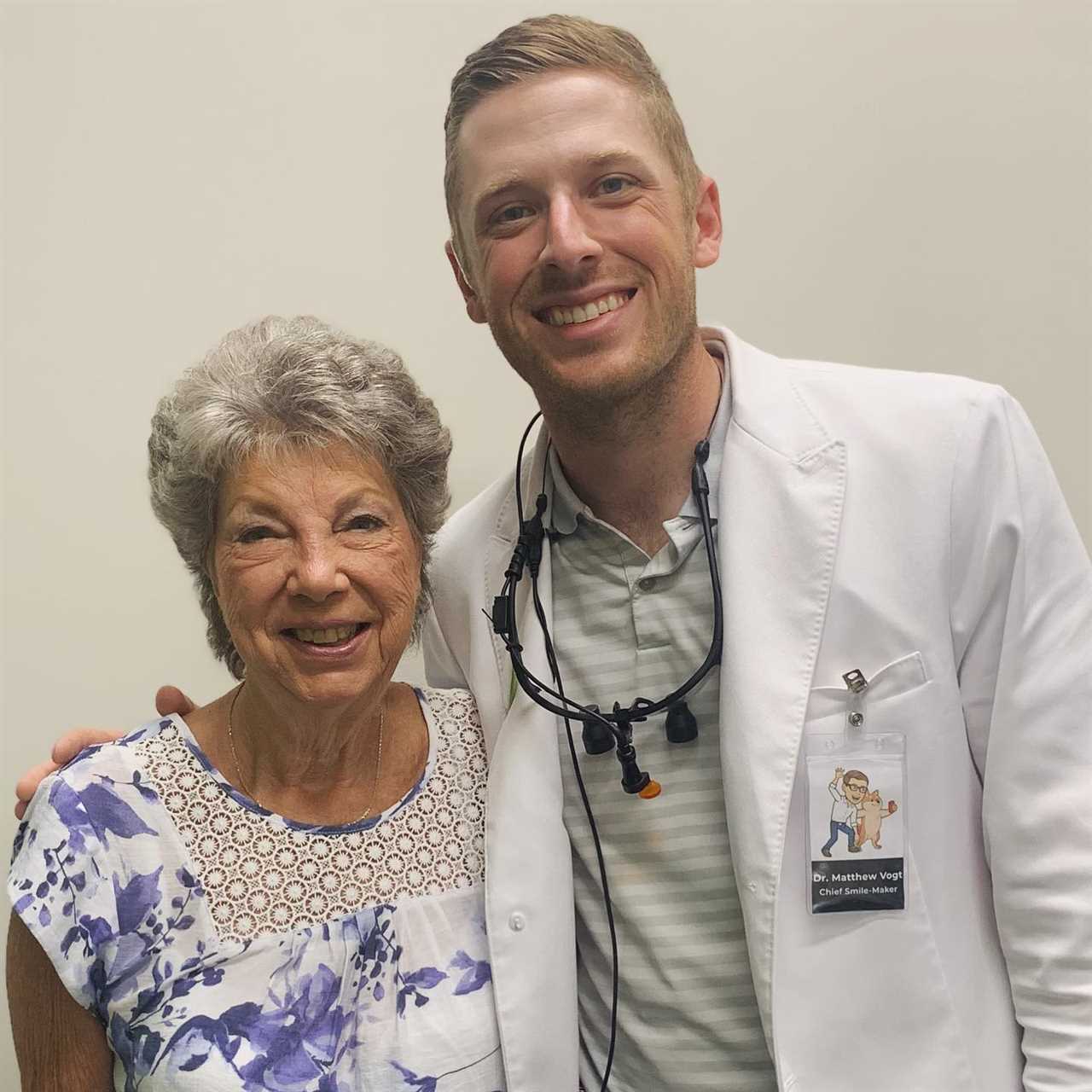 Photo of a dentist and a patient.