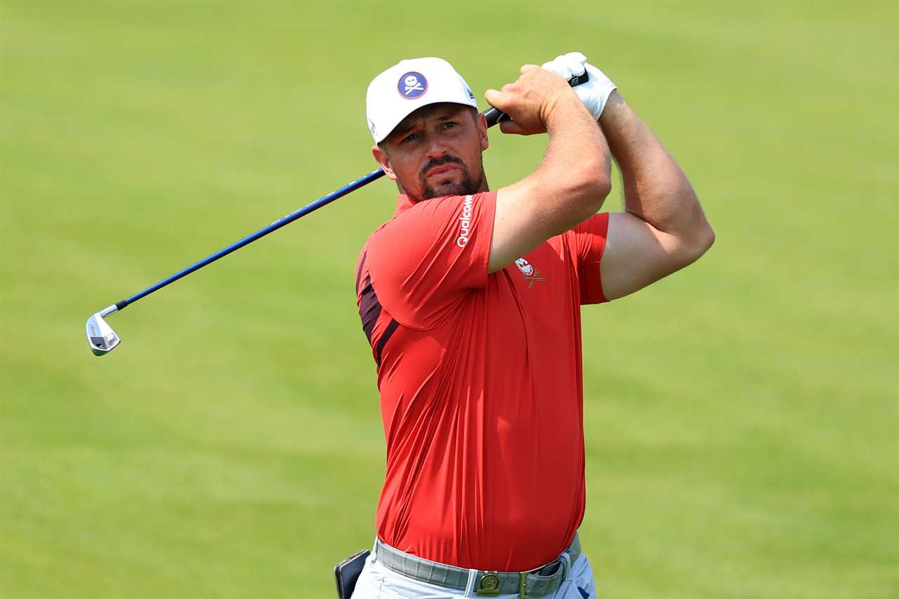 Bryson DeChambeau taking a golf swing.