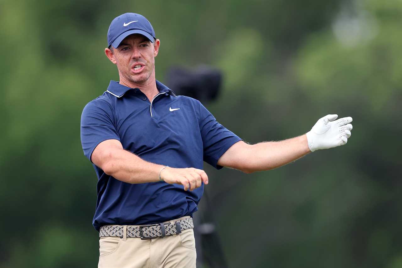 Rory McIlroy reacting to a golf shot.