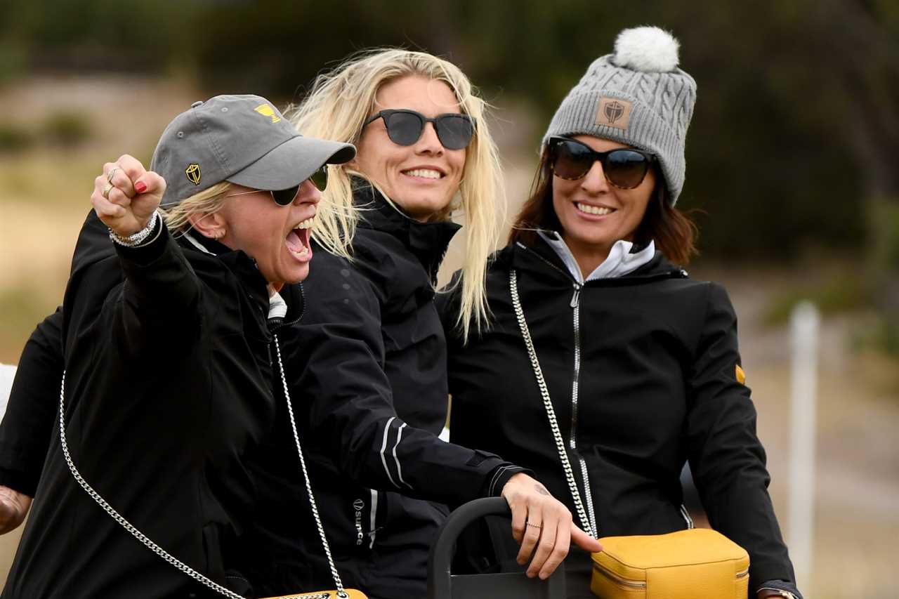 Three women react during a golf match.