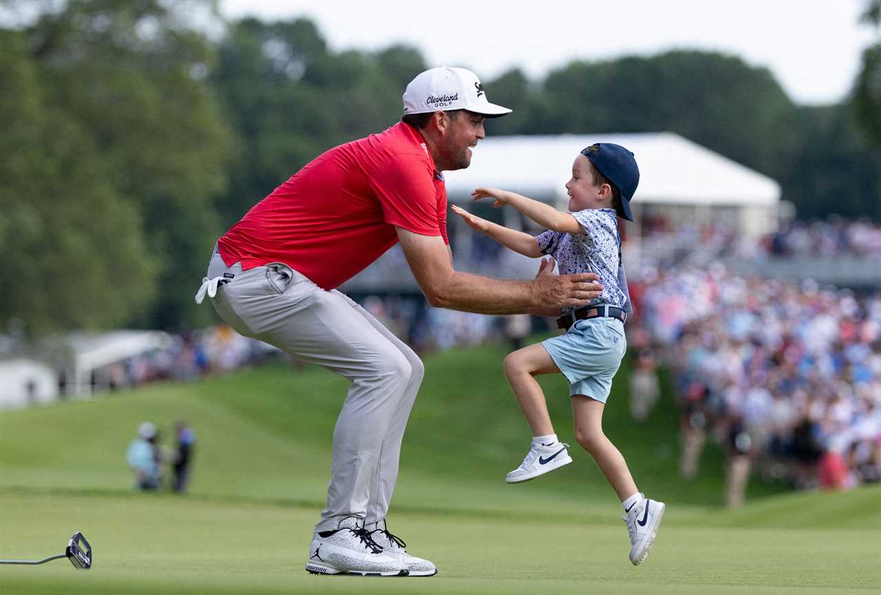 Keegan Bradley celebrates his Travelers Championship win with his son.