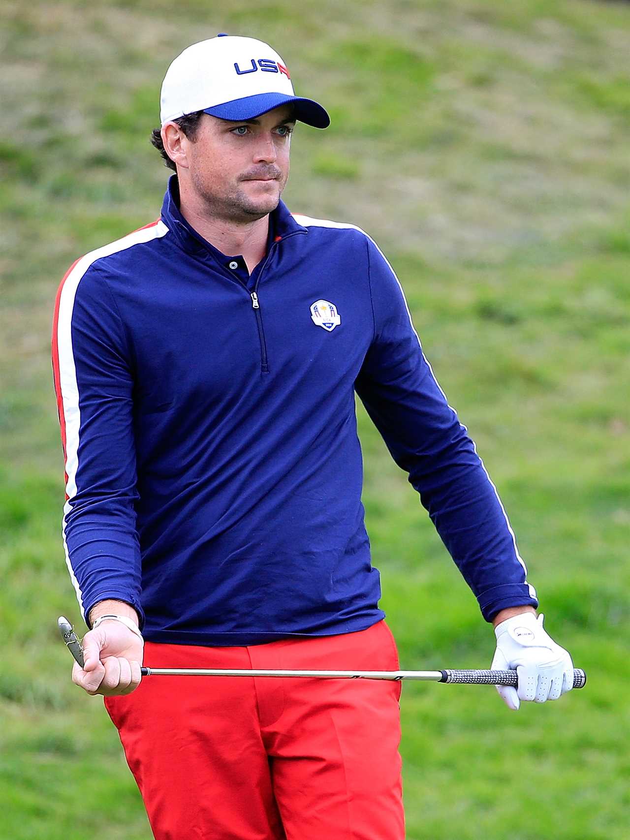 Keegan Bradley of the U.S. Ryder Cup team looks pensive.