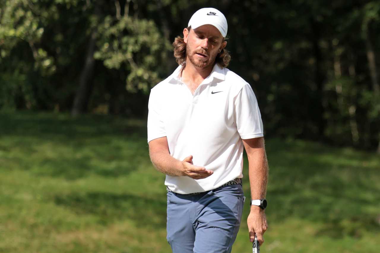 Tommy Fleetwood of England reacts to his putt.