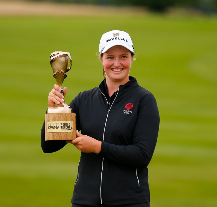 Mandatory Credit: Photo by Peter Fitzpatrick/Action Plus/Shutterstock (15386299al) Lottie Woad of England holds up the winners trophy; The O'Meara Course at Carton House, Maynooth, County Kildare, Ireland; KPMG Womens Irish Open Golf, Final Round. KPMG Women's Irish Golf Open, Final Round, Maynooth, County Kildare, Ireland - 06 Jul 2025