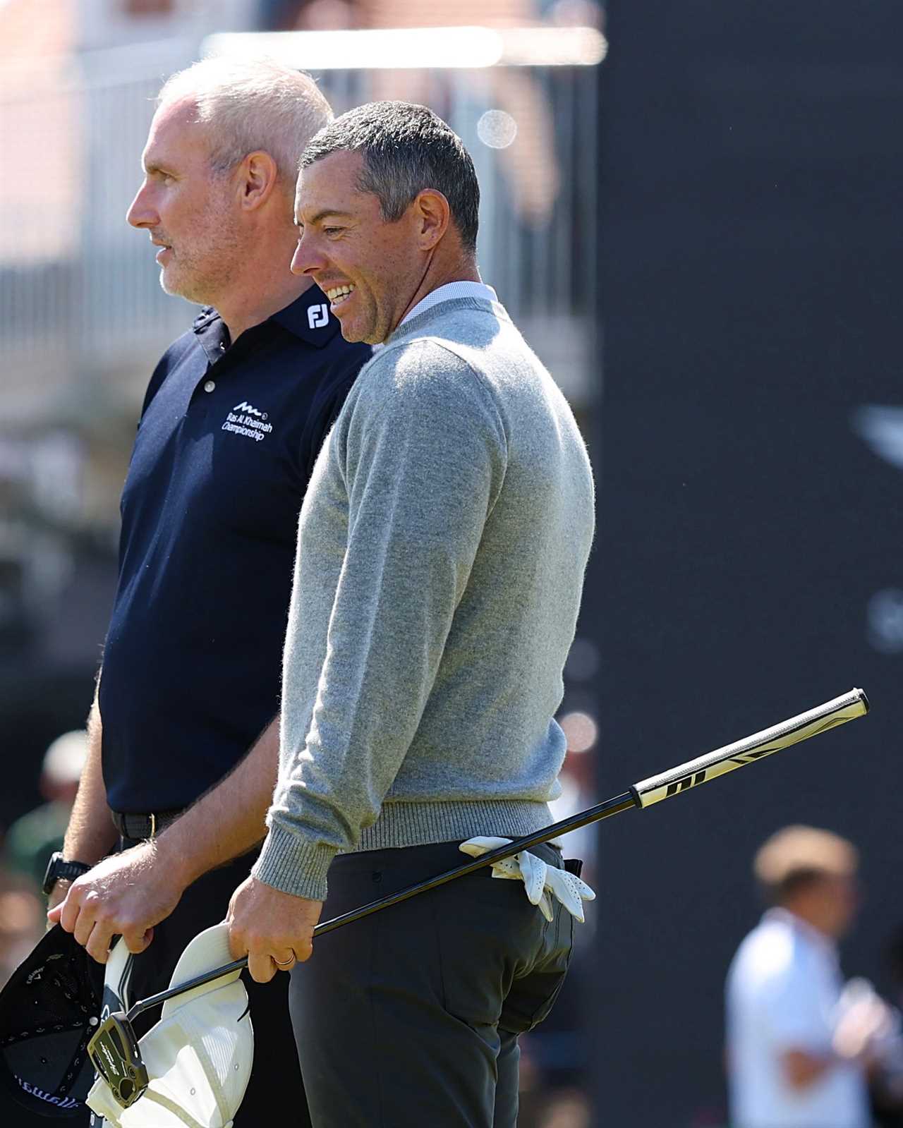Rory McIlroy and his caddie.