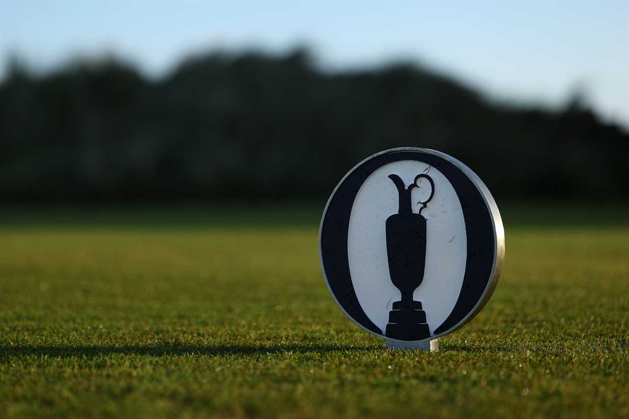 Golf tee marker with the British Open Championship trophy logo.