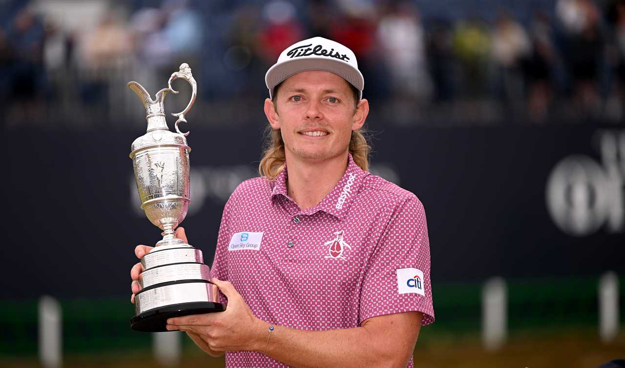 Cameron Smith holding the Claret Jug after winning The Open Championship.