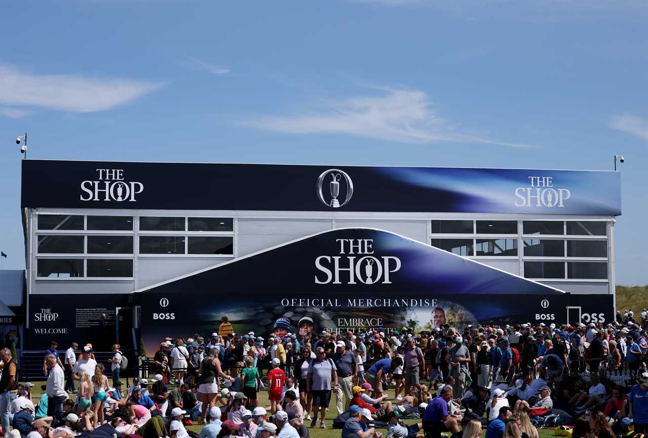 Golf fans queueing outside an official merchandise shop.
