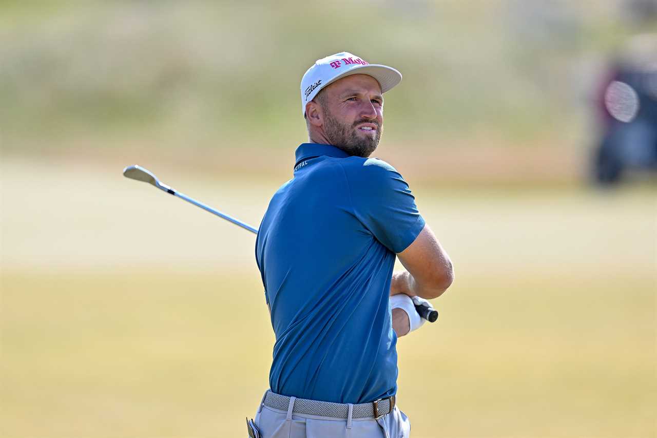 Wyndham Clark taking a golf shot.
