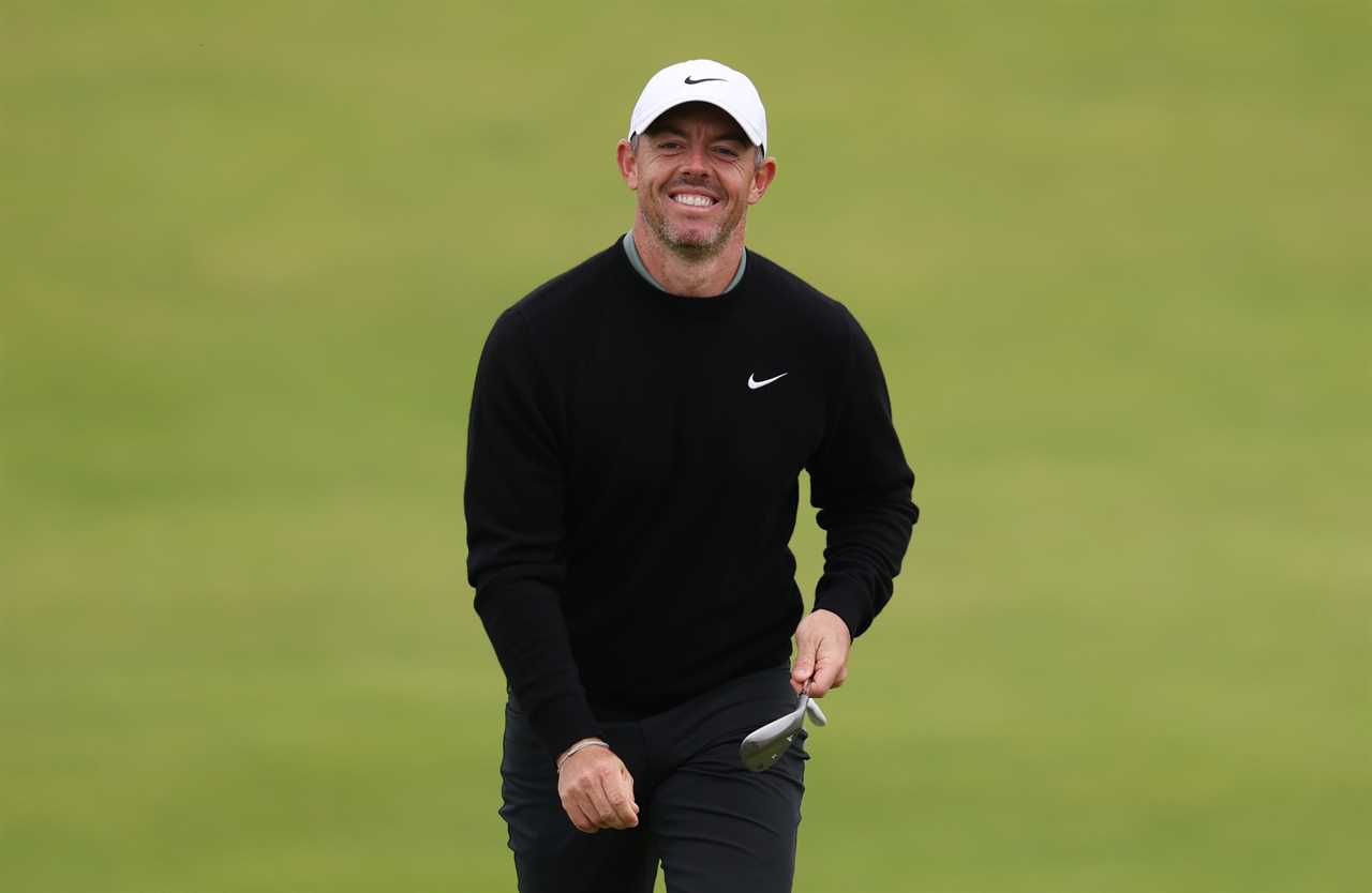 Rory McIlroy smiling during a practice round.