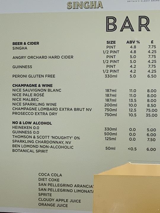 Singha Bar menu with beer, cider, wine, champagne, and non-alcoholic drink prices.