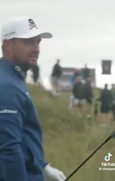 Golfer on golf course.