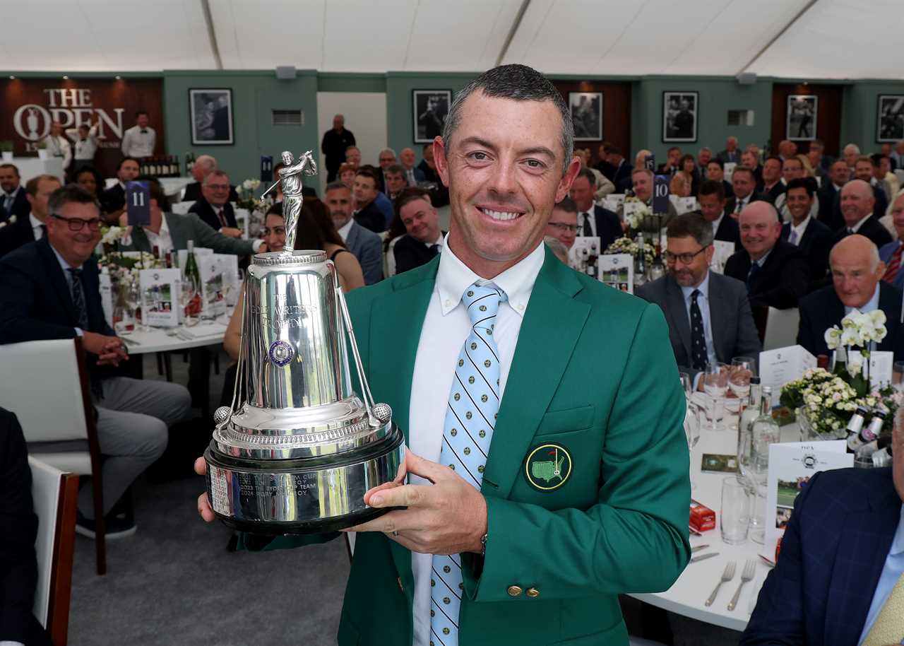 Rory McIlroy holding the 2024 Golfer of the Year award.